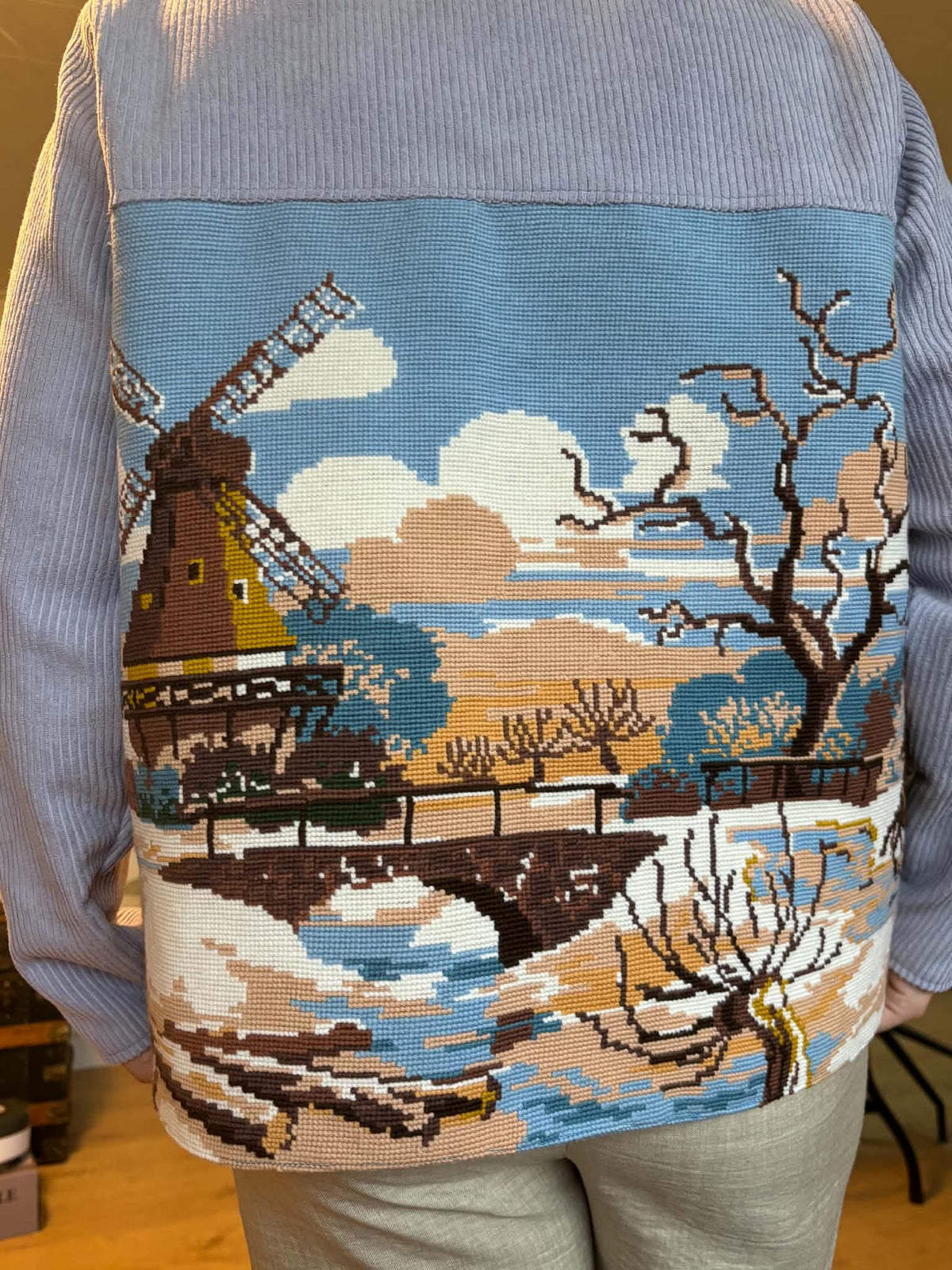 Close-up of snowy windmill tapestry back panel