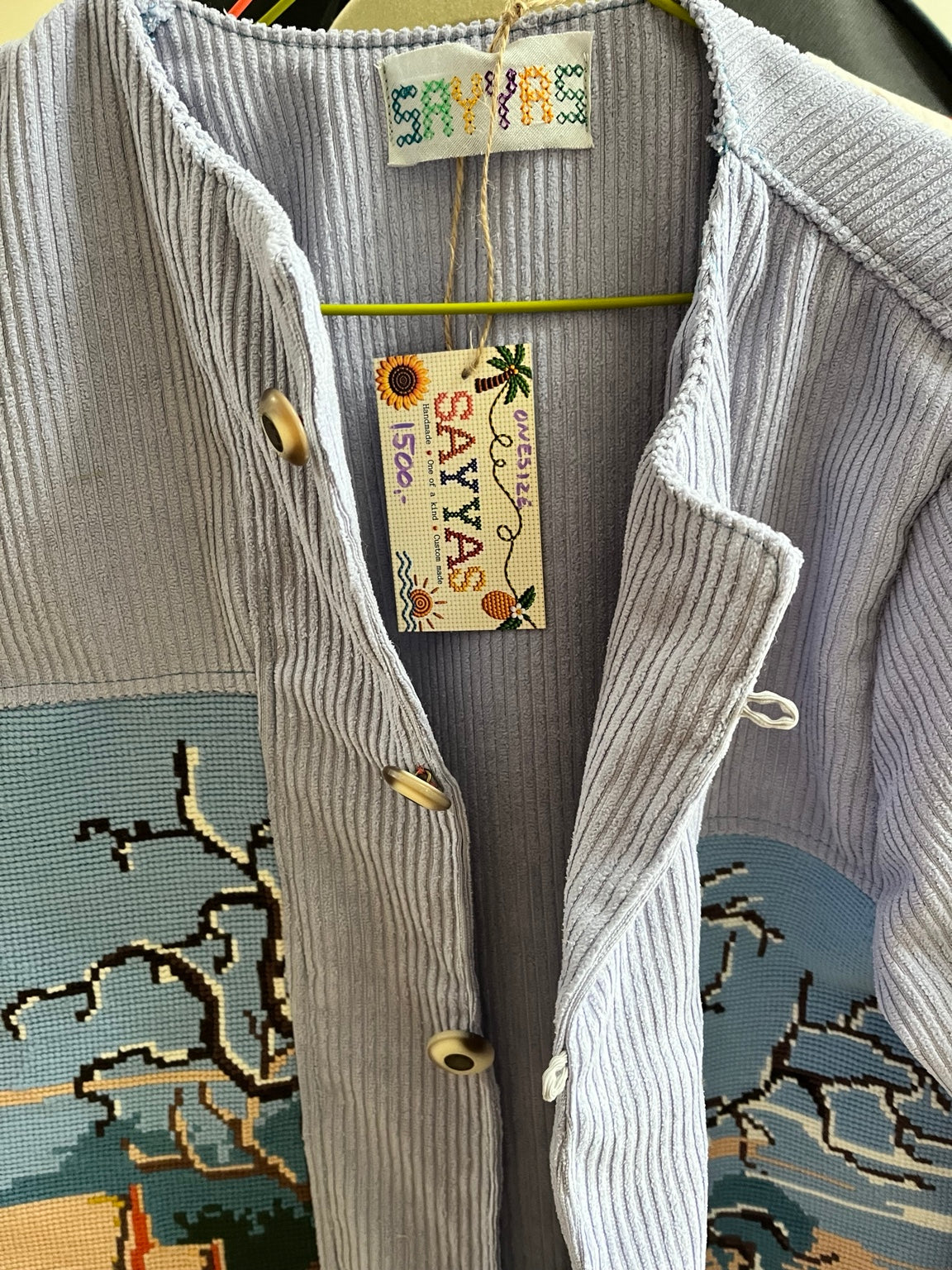 SAYYAS jacket label showing one size and price 1500