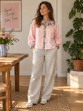 Pink Blouse with Floral Contrast Details — front view