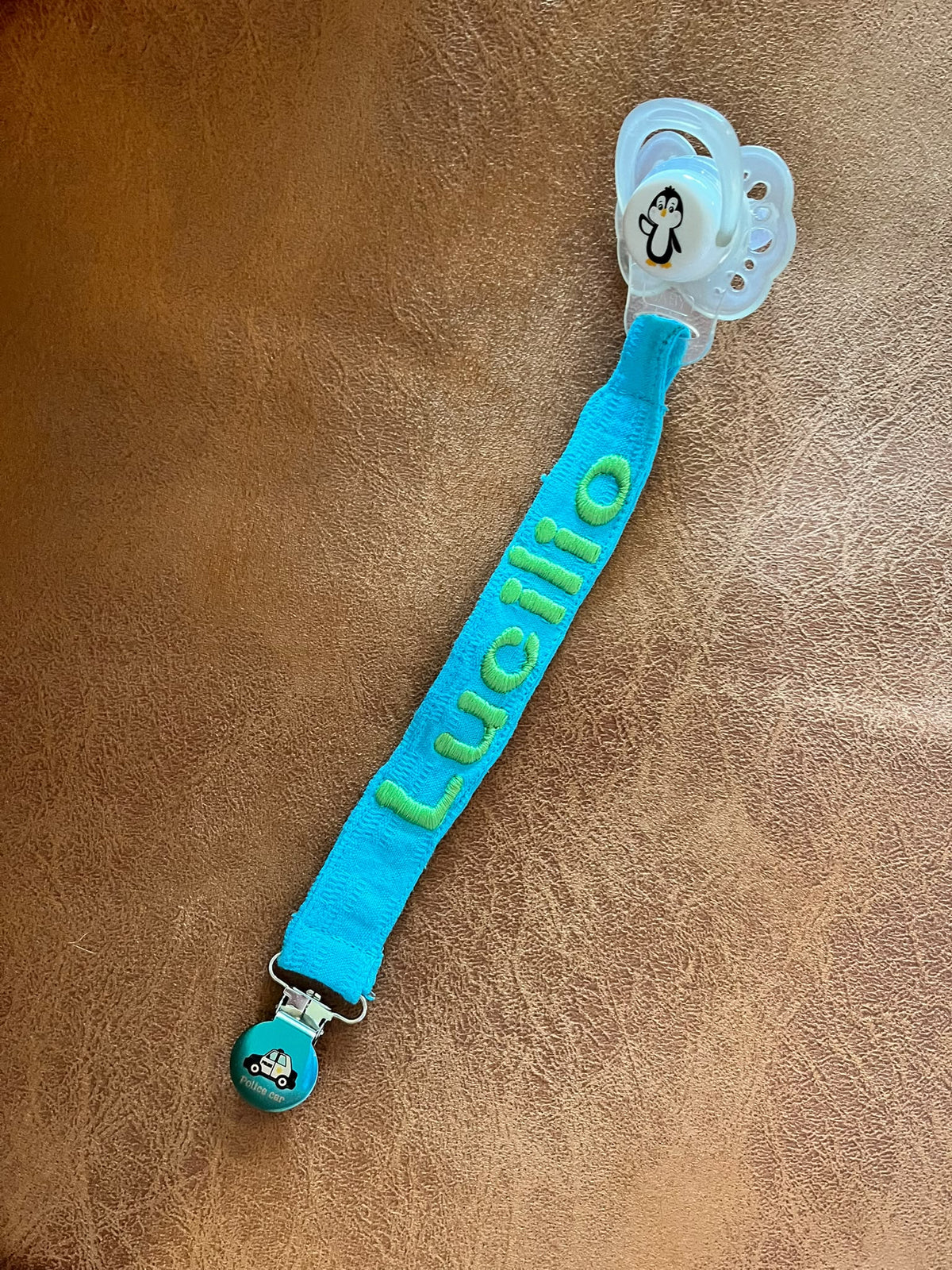 Turquoise Embroidered Name Pacifier Clip — front view