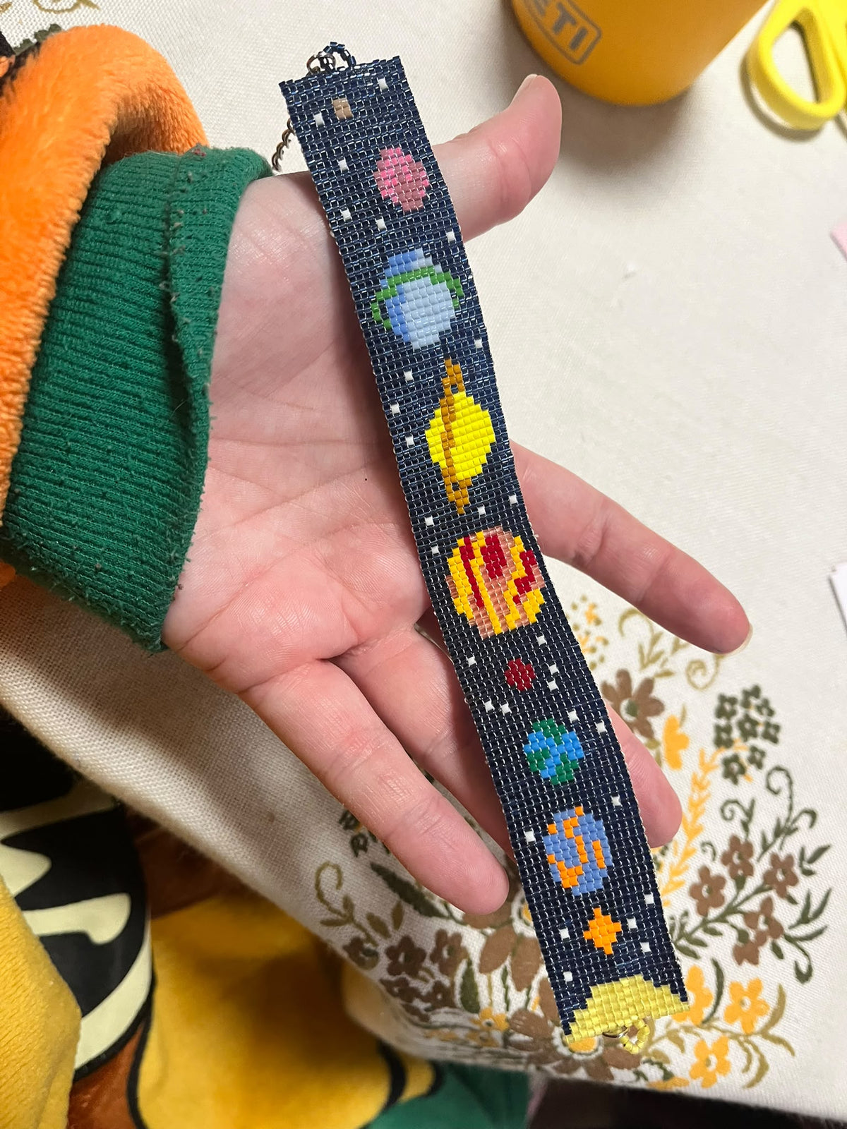 Handmade navy beaded anklet with colourful planets, Earth and stars